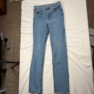 Levi’s 724 high rise straight leg jeans. Size 28. stretch. Medium light wash